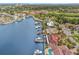 Waterfront home with solar panels and private dock, surrounded by other homes at 1818 Dolphin S Blvd, St Petersburg, FL 33707