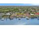 Waterfront home with solar panels and private dock, aerial view at 1818 Dolphin S Blvd, St Petersburg, FL 33707
