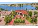 House with red tile roof and a red brick driveway, near the waterfront at 1818 Dolphin S Blvd, St Petersburg, FL 33707