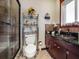 Clean bathroom with granite vanity and walk-in shower at 1818 Dolphin S Blvd, St Petersburg, FL 33707