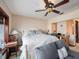 Main bedroom with built-in workspace and ceiling fan at 1818 Dolphin S Blvd, St Petersburg, FL 33707