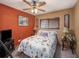 Cozy bedroom with a queen-size bed and ceiling fan at 1818 Dolphin S Blvd, St Petersburg, FL 33707