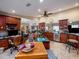 Island kitchen with granite countertops and wood cabinets at 1818 Dolphin S Blvd, St Petersburg, FL 33707