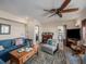 Living room with sectional sofa and access to bathroom at 1818 Dolphin S Blvd, St Petersburg, FL 33707