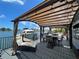 Covered patio overlooking the water with comfortable seating at 1818 Dolphin S Blvd, St Petersburg, FL 33707