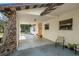 House entrance with covered walkway and stone accents at 18801 Orange Hill Dr, Hudson, FL 34667