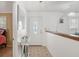 Bright entryway with tiled floors and a glass door at 18801 Orange Hill Dr, Hudson, FL 34667