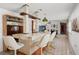 Retro kitchen with a breakfast bar and wood cabinets at 18801 Orange Hill Dr, Hudson, FL 34667