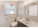 Bathroom with updated vanity and tiled floors at 21 Belle Meade Cir, Largo, FL 33770