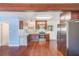 Modern kitchen featuring stainless steel appliances and hardwood floors at 21 Belle Meade Cir, Largo, FL 33770