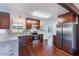 Modern kitchen with stainless steel appliances and granite countertops at 21 Belle Meade Cir, Largo, FL 33770