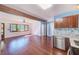 Hardwood floors and open concept living and kitchen at 21 Belle Meade Cir, Largo, FL 33770