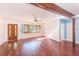 Living room with hardwood floors and large windows at 21 Belle Meade Cir, Largo, FL 33770