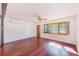 Spacious living room with hardwood floors and a view at 21 Belle Meade Cir, Largo, FL 33770
