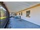 Screened patio with foosball table and backyard access at 21 Belle Meade Cir, Largo, FL 33770