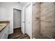 Clean bathroom with granite vanity and a large shower at 2820 Highlands Blvd # A, Palm Harbor, FL 34684