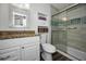 Clean bathroom with granite countertop and walk-in shower at 2820 Highlands Blvd # A, Palm Harbor, FL 34684