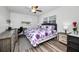 Spacious bedroom with a king-size bed and built-in desk at 2820 Highlands Blvd # A, Palm Harbor, FL 34684