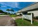 Andover Village clubhouse with signage and landscaping at 2820 Highlands Blvd # A, Palm Harbor, FL 34684