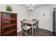 Cozy dining area with a square table and four chairs at 2820 Highlands Blvd # A, Palm Harbor, FL 34684