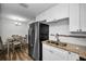 Kitchen boasts stainless steel appliances and granite countertops at 2820 Highlands Blvd # A, Palm Harbor, FL 34684