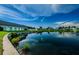 Scenic view of a lake with community buildings at 2820 Highlands Blvd # A, Palm Harbor, FL 34684