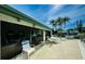 Community pool area with patio seating at 2820 Highlands Blvd # A, Palm Harbor, FL 34684