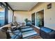 Relaxing screened patio with seating and access to interior at 2820 Highlands Blvd # A, Palm Harbor, FL 34684