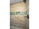 Walk-in shower with modern tile and built-in shelving at 2820 Highlands Blvd # A, Palm Harbor, FL 34684