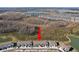 Aerial view of townhomes near a nature preserve at 32241 Turtle Grace Loop, Wesley Chapel, FL 33545