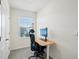 Home office with window, desk, and ergonomic chair at 32241 Turtle Grace Loop, Wesley Chapel, FL 33545