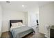 Bedroom with a desk and a bed, offering a functional space at 32241 Turtle Grace Loop, Wesley Chapel, FL 33545