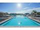 Resort-style pool with multiple lounging areas at 32241 Turtle Grace Loop, Wesley Chapel, FL 33545