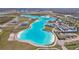 Aerial view of a large crystal lagoon at 32241 Turtle Grace Loop, Wesley Chapel, FL 33545