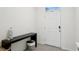 Bright entryway with console table and storage at 32241 Turtle Grace Loop, Wesley Chapel, FL 33545