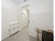 Clean hallway with tile floors and access to other rooms at 32241 Turtle Grace Loop, Wesley Chapel, FL 33545