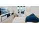 Living room with sectional sofa and large screen TV at 32241 Turtle Grace Loop, Wesley Chapel, FL 33545