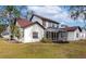 Features a screened-in porch and a well-maintained lawn at 3404 Shady Brook Ln, Sarasota, FL 34243