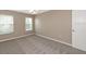 Spacious bedroom with neutral walls and carpeting at 3404 Shady Brook Ln, Sarasota, FL 34243