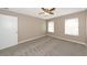 Bedroom with ceiling fan and neutral decor at 3404 Shady Brook Ln, Sarasota, FL 34243