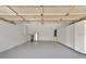 Garage with built-in cabinets and extra storage at 3404 Shady Brook Ln, Sarasota, FL 34243