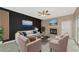 Living room with fireplace and modern furnishings at 3404 Shady Brook Ln, Sarasota, FL 34243