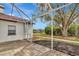 Screened patio overlooking backyard and golf course at 3404 Shady Brook Ln, Sarasota, FL 34243