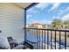Balcony overlooking a canal, featuring outdoor furniture and a view of the water at 355 Moorings Cove Dr # 355, Tarpon Springs, FL 34689