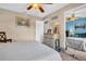 Main bedroom with dresser and mirrored closet doors at 355 Moorings Cove Dr # 355, Tarpon Springs, FL 34689
