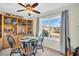 Small dining area with a round table and chairs, offering a water view at 355 Moorings Cove Dr # 355, Tarpon Springs, FL 34689