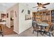 Bright dining area with built-in shelving and table for four at 355 Moorings Cove Dr # 355, Tarpon Springs, FL 34689