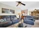 Relaxing living room featuring two comfy armchairs and a coffee table at 355 Moorings Cove Dr # 355, Tarpon Springs, FL 34689