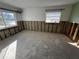 Image shows a bedroom undergoing renovation with exposed walls and flooring at 4000 Huntington Ne St, St Petersburg, FL 33703