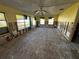 Living room undergoing renovation; exposed walls and flooring at 4000 Huntington Ne St, St Petersburg, FL 33703